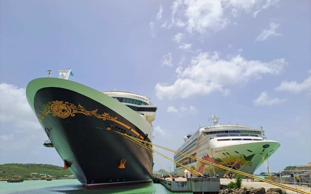 Disney Fantasy and Norwegian Sky dock at Antigua Cruise Port during summer season