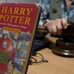 Harry Potter book rescued from a bin sells at auction for £21,000