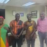 Daryll Matthew meets with members of the Creek Side Rastafarian community