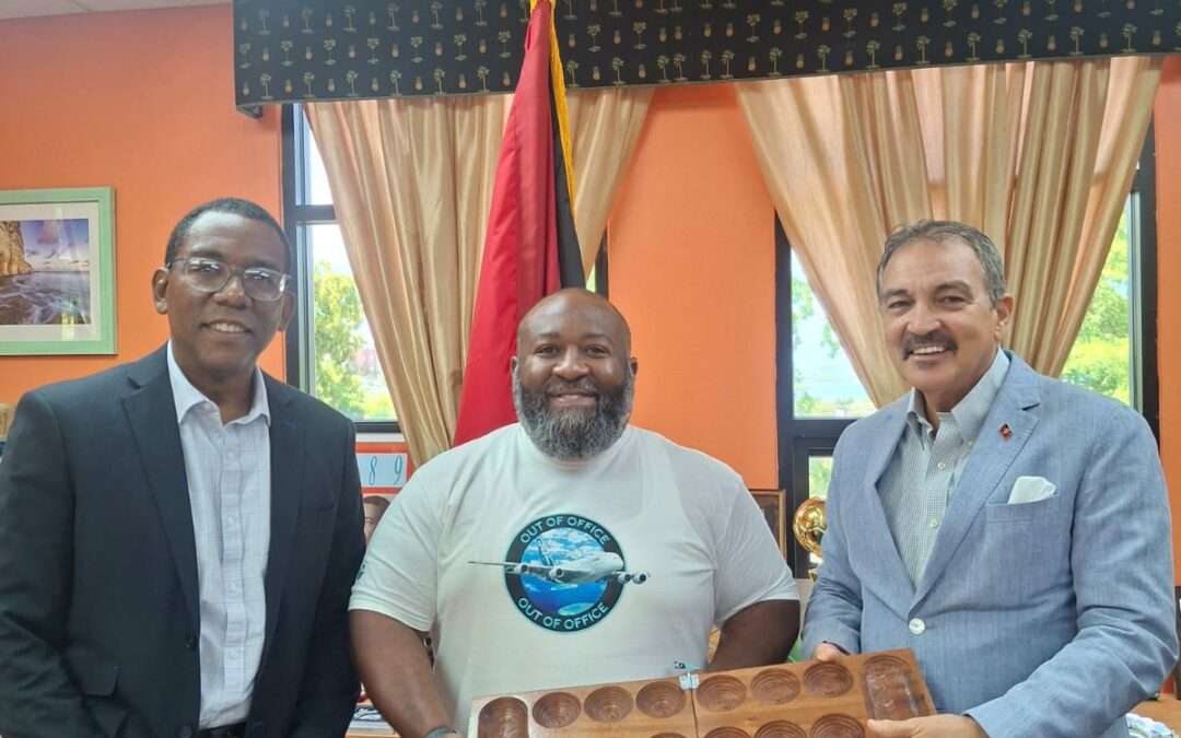 Minister Fernandez Gifts U.S. Travel Group Head in Appreciation of Timely Donation to Cedar Grove Primary School