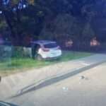 Vehicle Crashes into Fence, All Passengers Safe