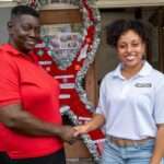 CAUTION J’ouvert Donates Equipment to AIDS Secretariat for World AIDS Day Outreach