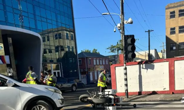 Motorist Collides with Parked Police Motorcycle During Early-Morning Route March