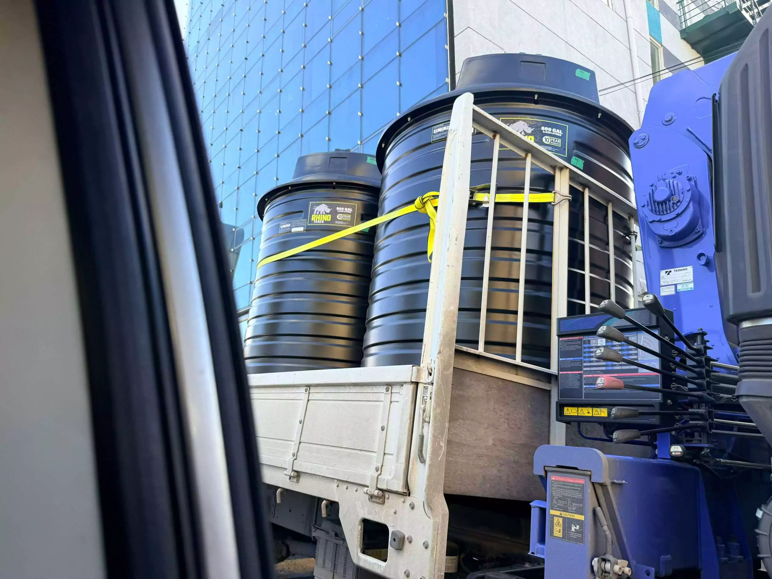 APUA Delivers Water Storage Tanks and Pumps to Winners of Christmas Promotion