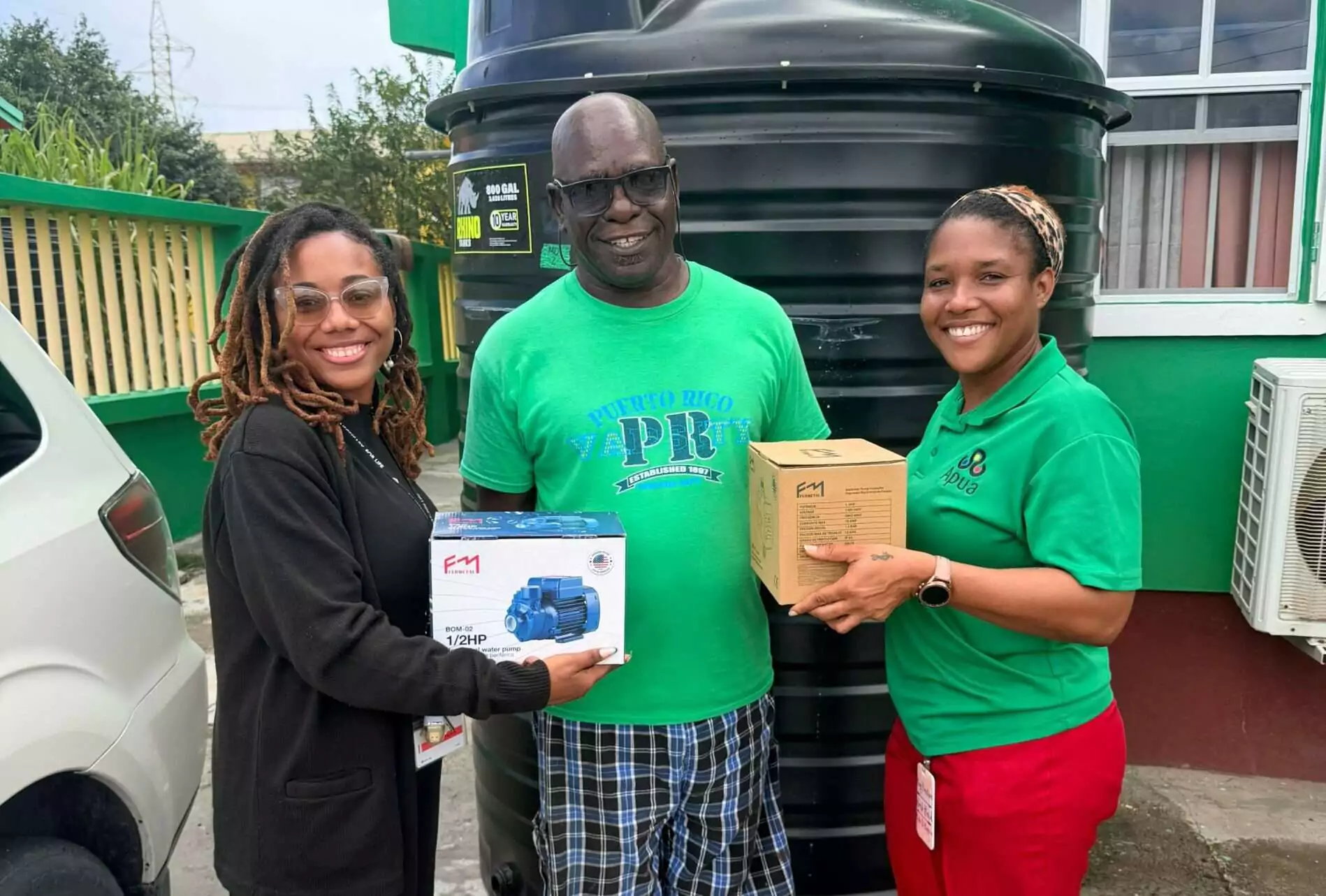 APUA Delivers Water Storage Tanks and Pumps to Winners of Christmas Promotion