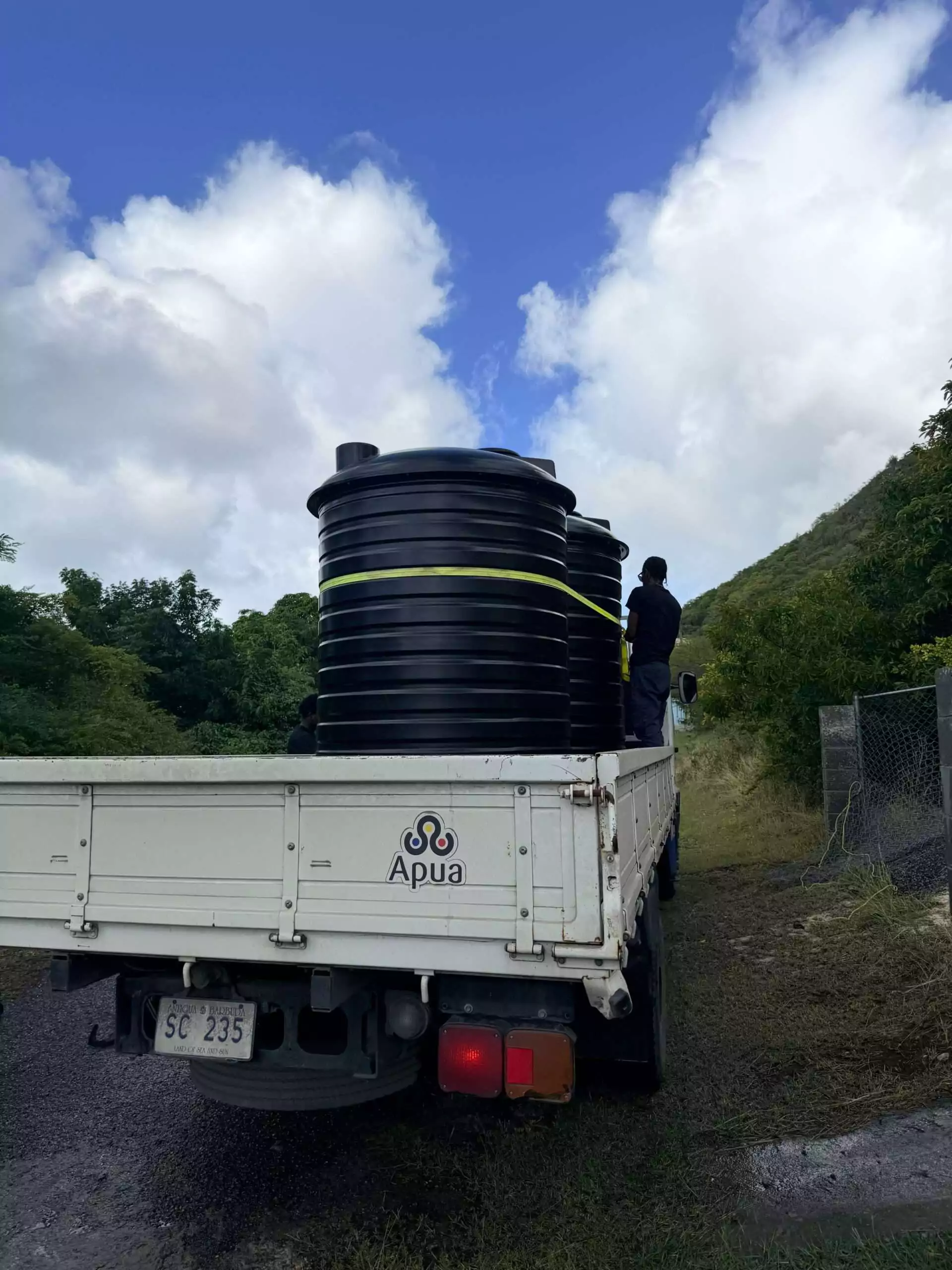 APUA Delivers Water Storage Tanks and Pumps to Winners of Christmas Promotion