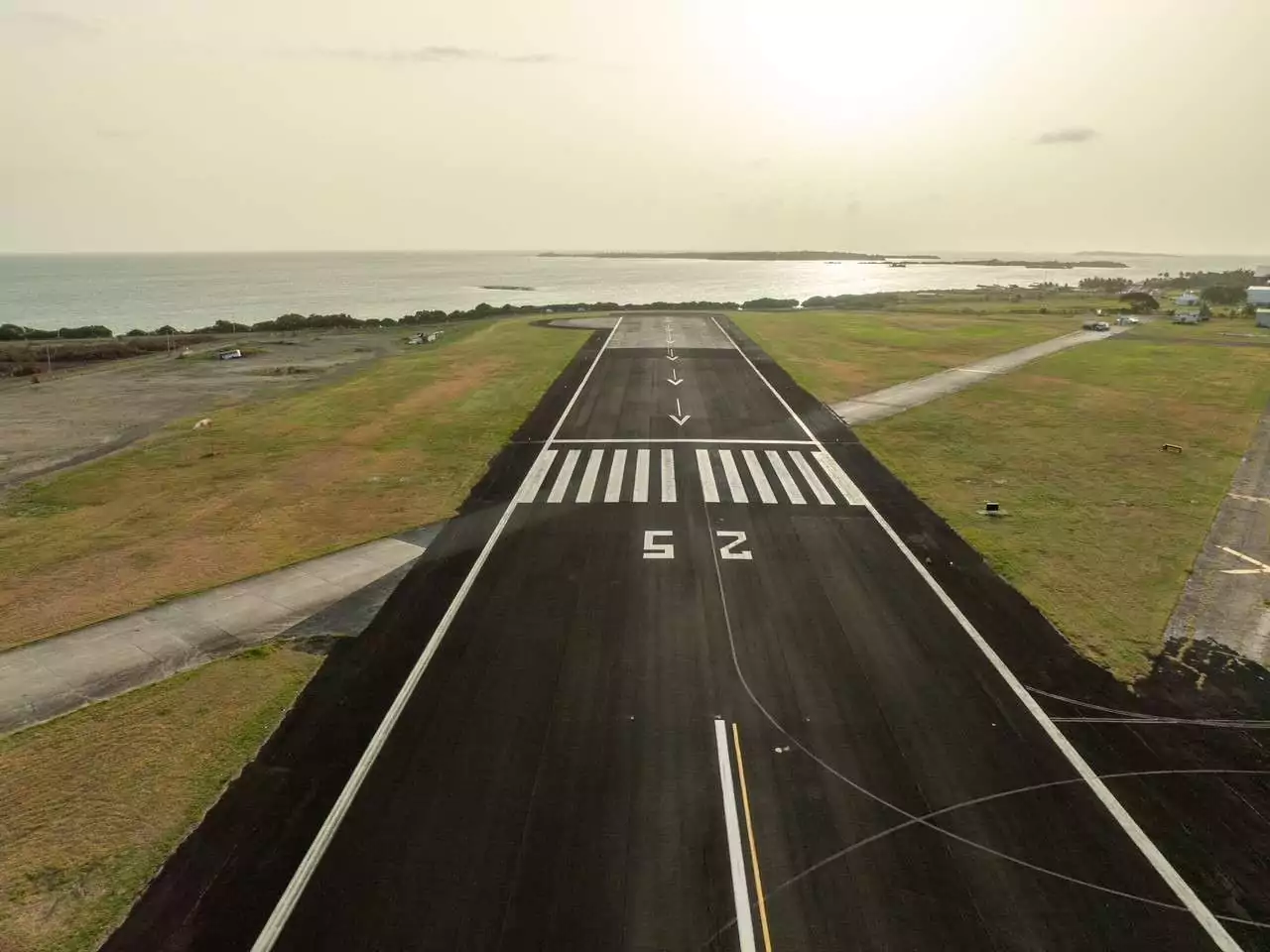 ST. GEORGE, 1st March, 2026…The multi-million dollar upgrade to the airfield of the VC Bird International Airport is recording steady progress and the project has now seamlessly moved into another critical phase. The third phase of the project is now underway and like the previous phases will see the completion of important airside enhancements designed to align the VC Bird International with global and modern aviation standards. Members of the public and nearby communities are asked to note that the work in this third phase will take place during the night time hours, starting at 8pm and ending at 8am the following day from Monday until Saturday each week until 15 April, the anticipated date of completion. This phase of the project will involve reconstructing the asphalt section of the displaced Runway 07 and a new Runway End Safety Area (RESA). The RESA is a crucial safety provision that reduces risk if an aircraft overshoots or veers off the runway. Also in this phase, the construction and technical teams will install new approach lights, runway edge lights, and turnpad edge lights across the airfield. These upgrades will improve visibility and enhance overall operational efficiency for aircraft during takeoff and landing at the VC Bird International Airport.